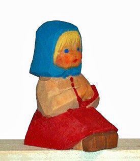 Maedchen sitzend