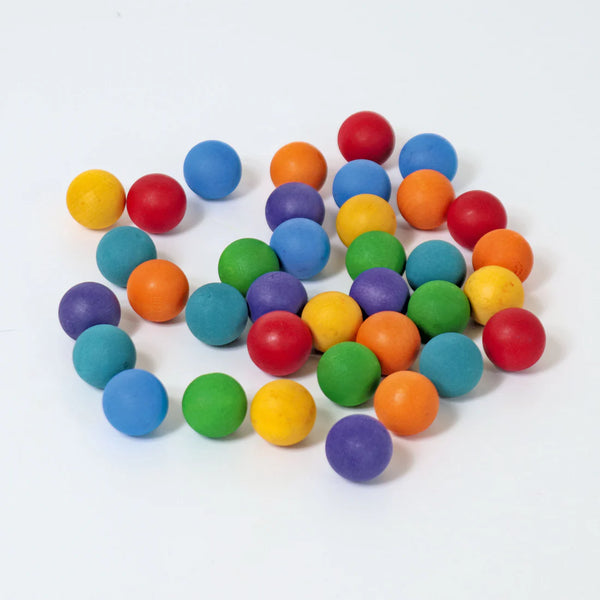 Bunte kleine Holzmurmeln von Grimms