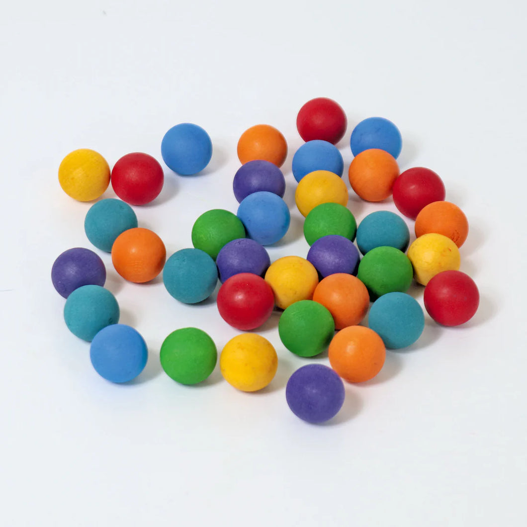 Bunte kleine Holzmurmeln von Grimms