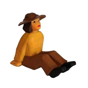 Hirte, sitzend mit Hut